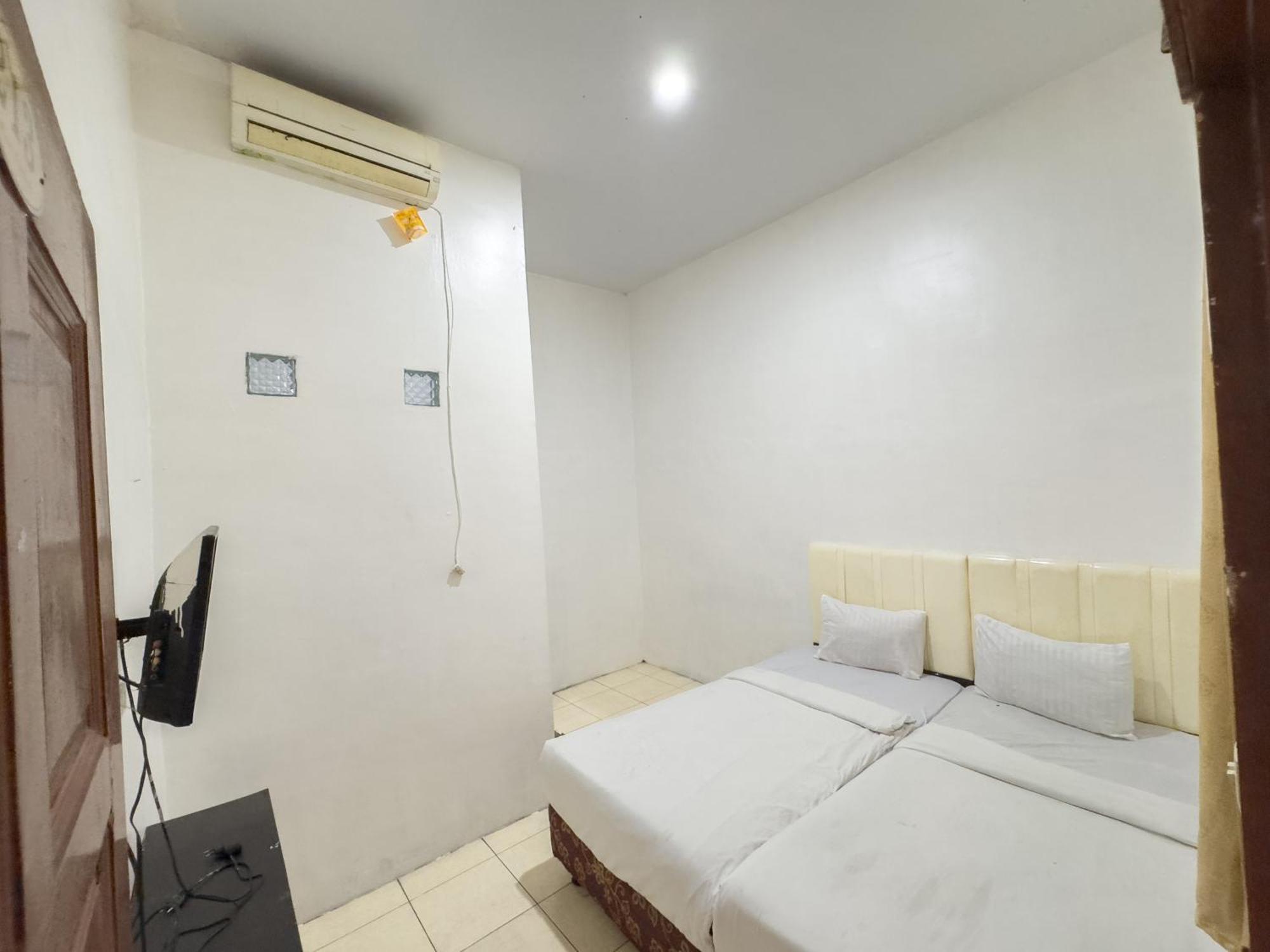 Pondok Wisata Istana XI Medan Esterno foto